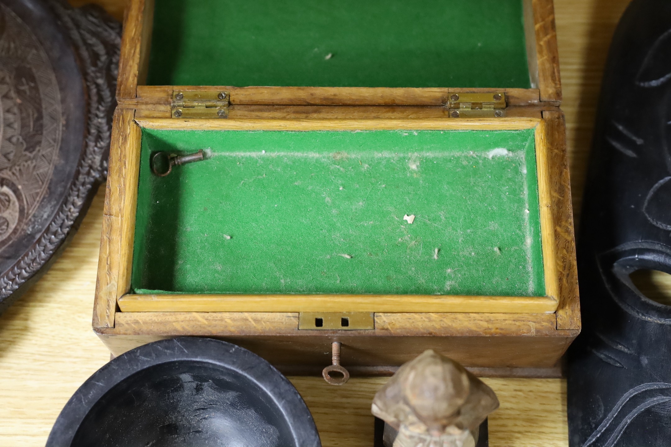 A Chinese carved wood circular tray, an oak dome-topped box and three other items